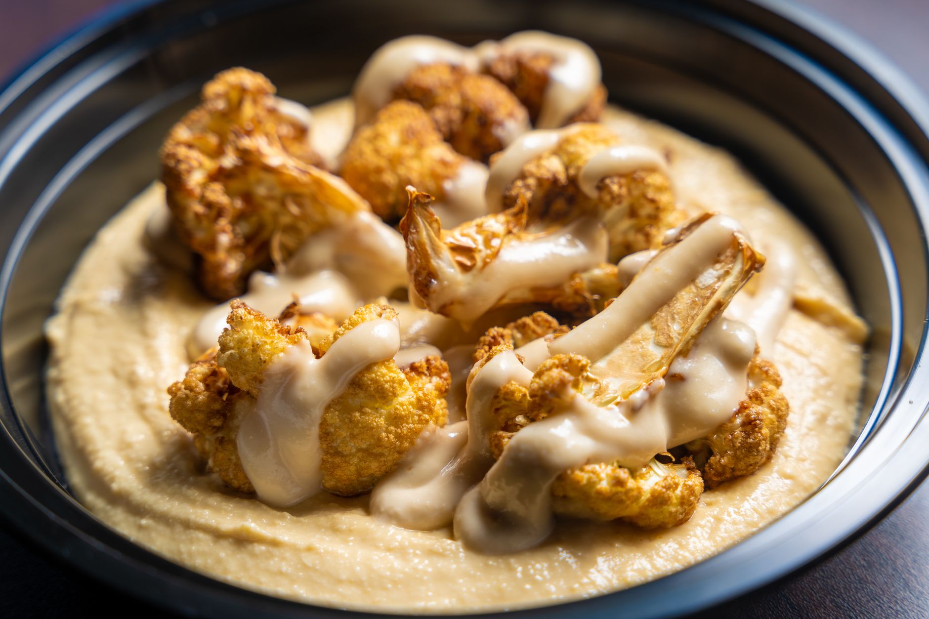 Crispy Roasted Spiced Cauliflower with Creamy Tahini & Pomegranate